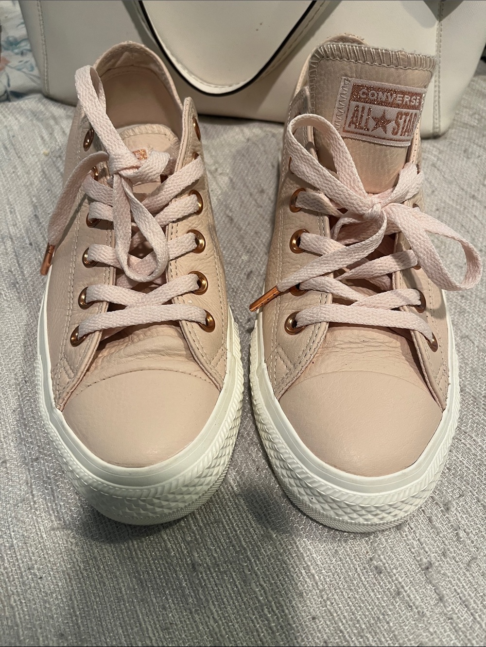 Converse Pink Low Top Sneakers with Rose Gold Accents